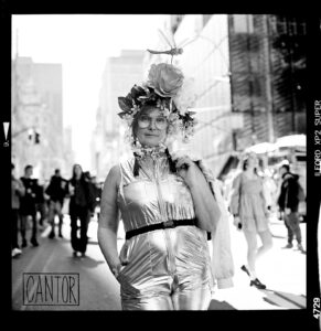 Easter Parade goer in shiny satin on Fifth Avenue, NYC