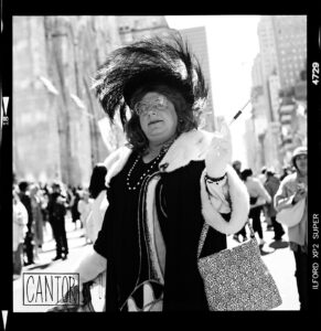 Easter Parade goer in feathers on Fifth Avenue, NYC