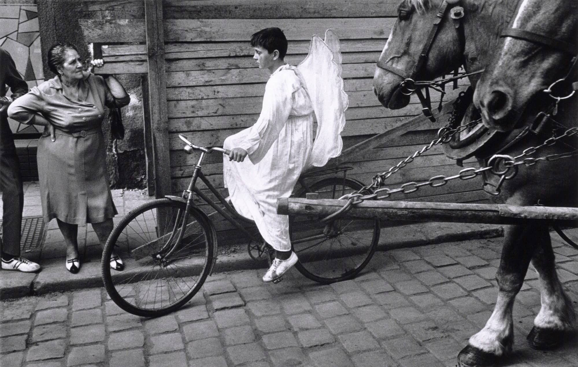 Josef Koudelka's angel boy on bicycle